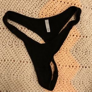 ARQ Sylvia Thong in black